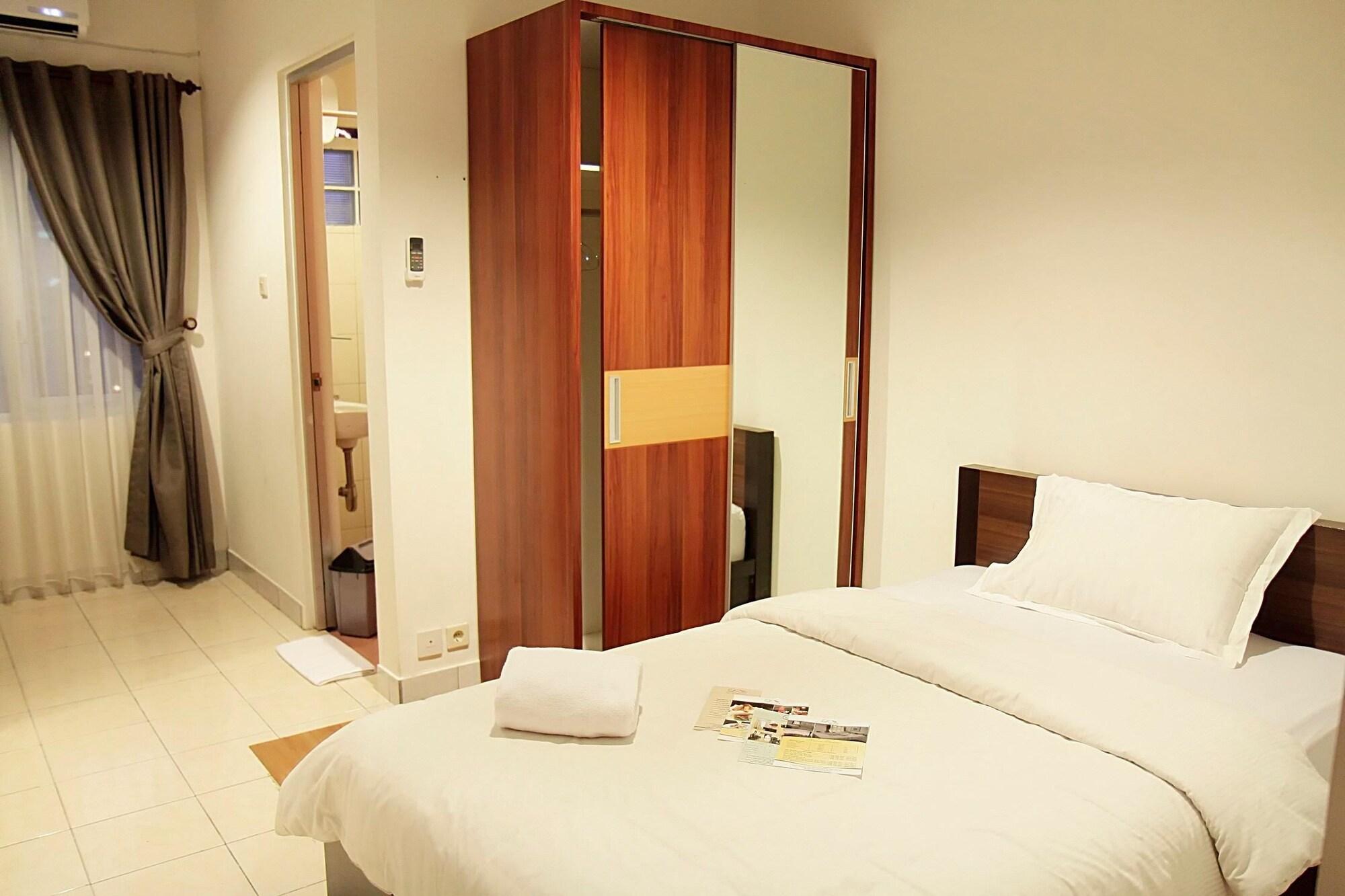 โลตัส บันดุง โฮเต็ล คาเฟ่ แอนด์ มีตติ้ง เพลซ Hotel ภายนอก รูปภาพ